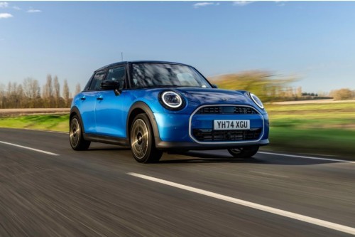 MINI 5-Door hatchabck in motion on an urban street